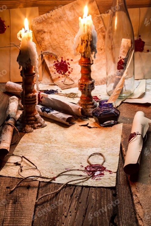 Preview: Vintage scrolls and candles are the old scribe's workplace
