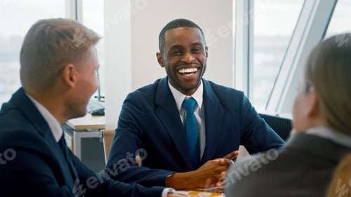Preview: Smiling ceo with work group in the office