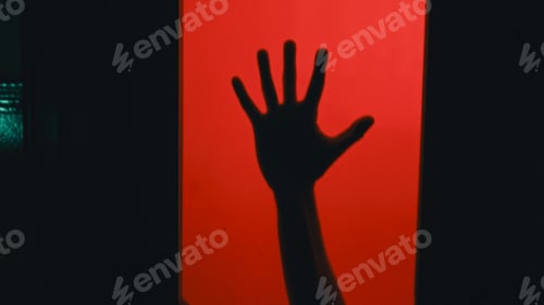 Preview: Arm With Knife Behind A Glass Door