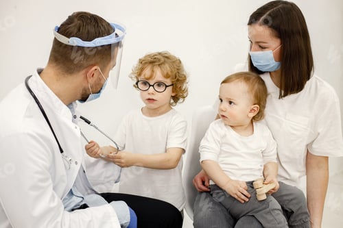 Preview: Mother and two her sons have an appointment with pediatrician