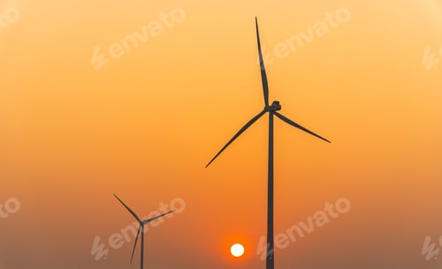 Preview: Electricity windmill on sunset sky in the evening, ecology power concept
