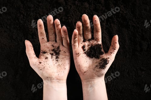 Preview: Woman with fresh soil, top view. Organic matter