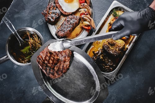 Preview: Grilled meat platter. Assorted delicious grilled meat with vegetables. Grilled mixed meat with