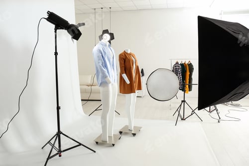 Preview: Ghost mannequins with modern clothes in professional photo studio