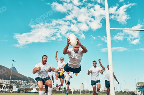 Preview: Hes the man of the match. Shot of a rugby player scoring a try while playing on a field.