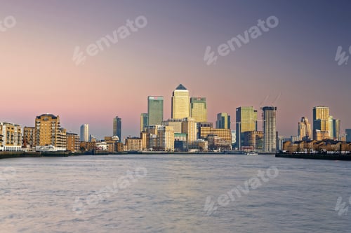 Preview: UK, London, skyline of Canary Wharf at River Thames at dusk