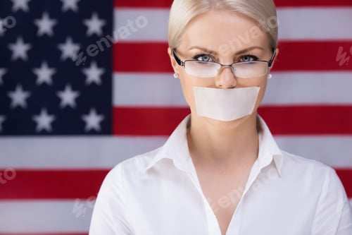 Woman with Tape over Mouth against Flag