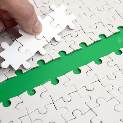 Preview: The human hand paves the way to the surface of the jigsaw puzzle