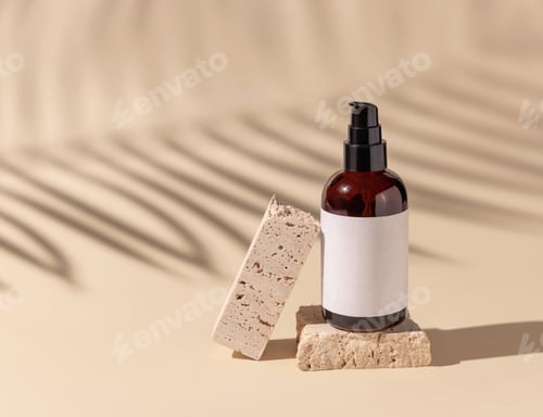 Preview: Glass cosmetic one pump bottle on stone on light beige. Palm leaf hard shadows. Label Mockup