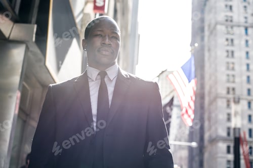 Preview: Confident businessman walking