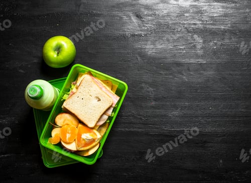 Preview: Morning picnic. Sandwiches milkshake and fruit.