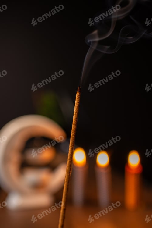 Preview: Burning aromatic incense smoky stick for meditation and relaxing. Aromatherapy smoke for yoga