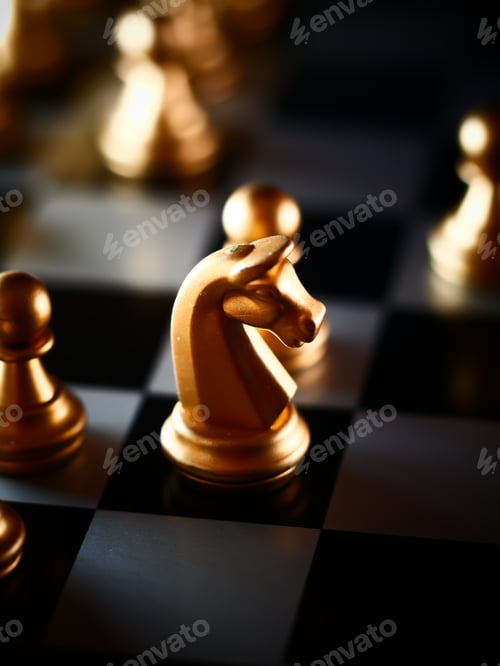 Preview: Selective focus shot of golden knight and pawn chess pieces on a chessboard