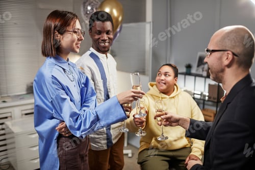 Preview: Colleagues Chatting at Office Party