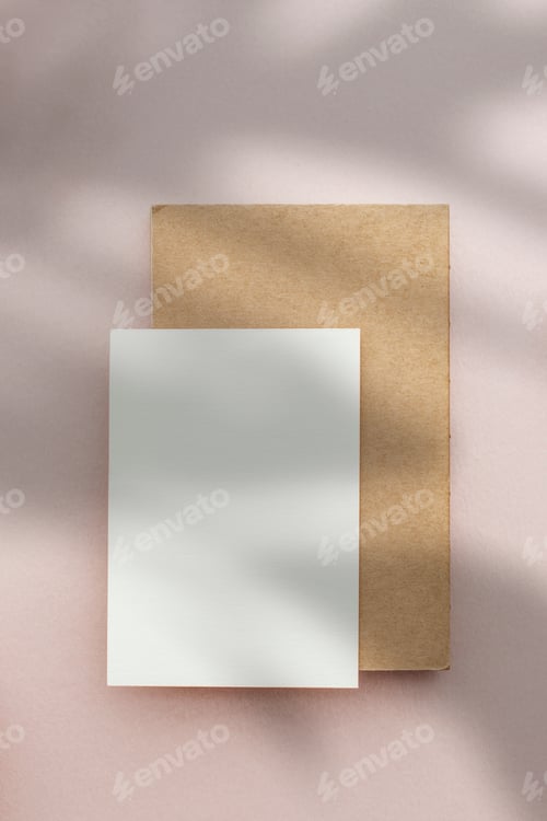 Preview: Blank postcard with envelop on a pink background