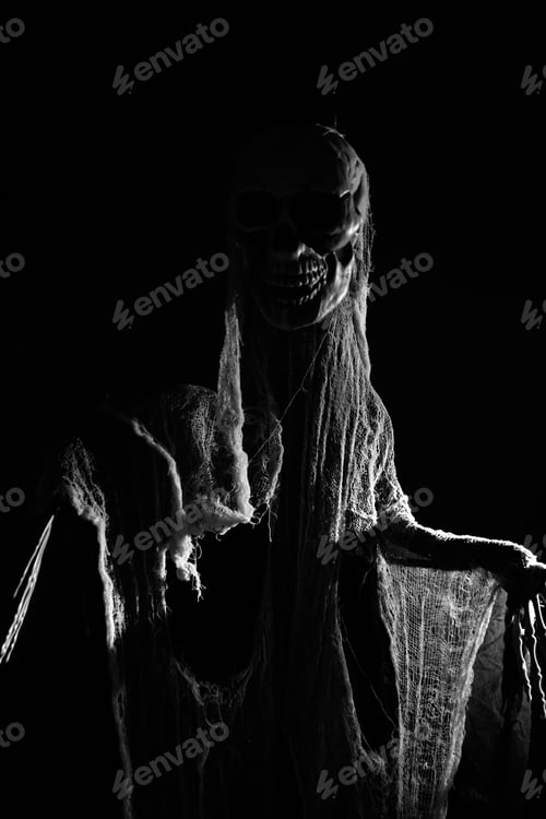 Preview: Mysterious creature with skull in smoke under the blue night light for Halloween