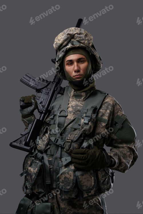 Preview: Modern Soldier holding a weapon against a grey backdrop