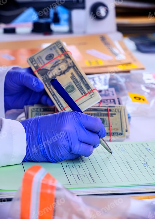 Preview: Police scientist notes down serial numbers of U.S. bills from a crime lab robbery, concept image