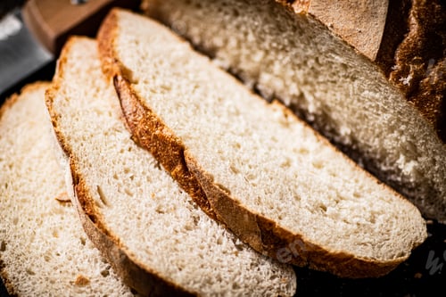 Preview: Pieces of wheat bread. Macro background.