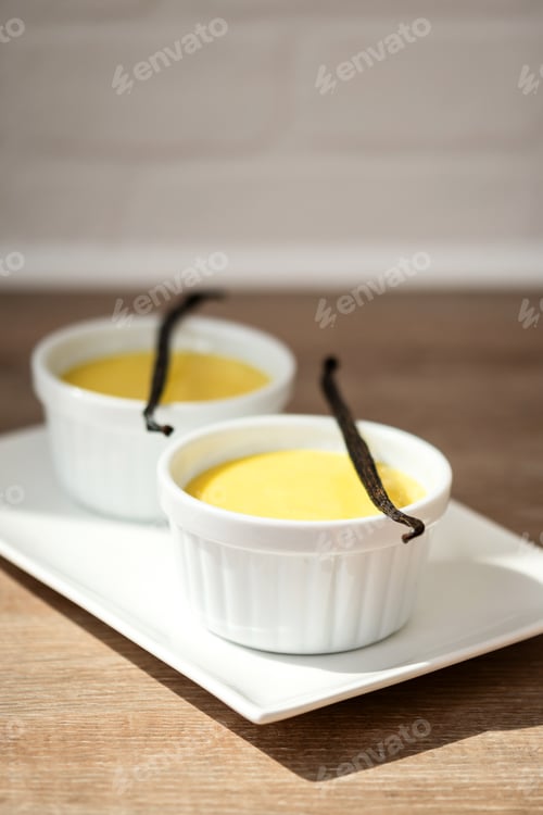 Preview: Homemade vanilla custard on wooden table