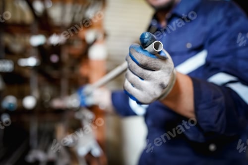 Preview: Industrial factory employee working in metal manufacturing industry