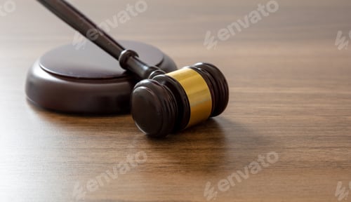 Preview: Judge gavel on lawyer office desk, close up view, copy space. Law or auction concept.