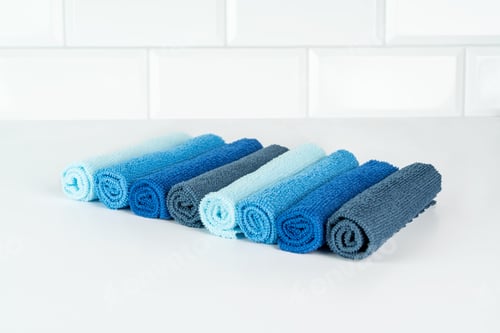 Preview: A row of colorful microfiber cloths for housekeeping and cleaning