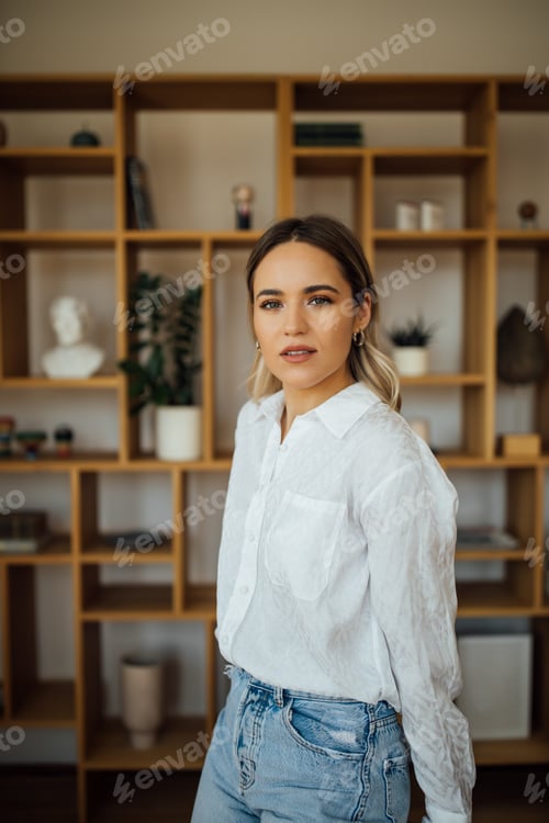 Preview: Woman in White Shirt and Jeans Posing Indoors