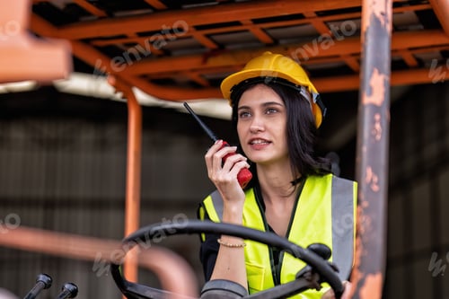 Preview: In robotic maintenance shop forklift operator radio to team driving truck deliver repair parts