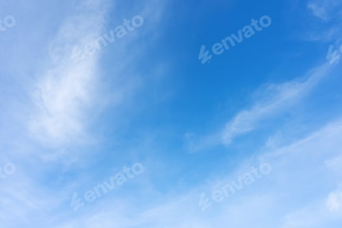 Preview: Blue sky with white clouds in sunny day.