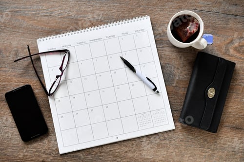 Preview: Overhead flat lay view of calendar, scheduling work personal appointments - generic no month year