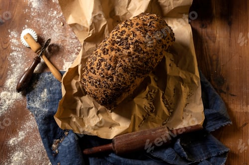 Preview: Closeup of homemade sourdough bread with seeds.
