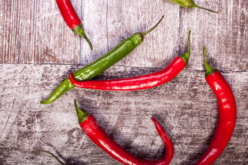 Preview: Spicy pepper on wooden background