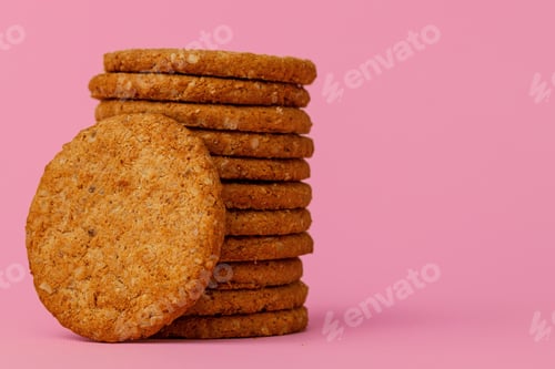 Preview: Stack of round oat cookies on paper background