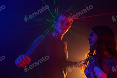 Preview: People Dancing in Neon Lights