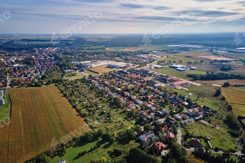 Preview: Aerial view of suburban area with residential houses and industrial zone