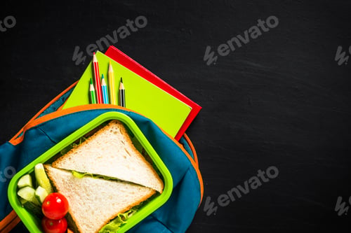 Preview: Back to school concept. Lunch box, stationery and backpack