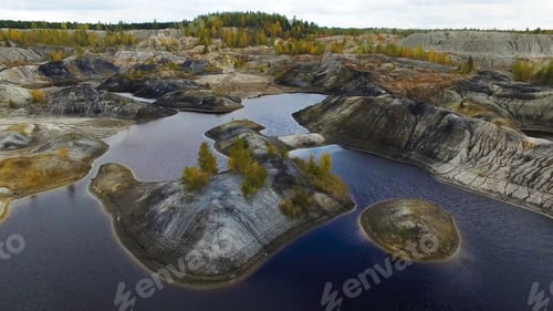 Preview: Small lake, top view. Footage. A small lake in a mountainous area. Panoramic view over the rocky
