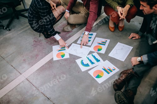 Preview: Gathered around the colorful business data