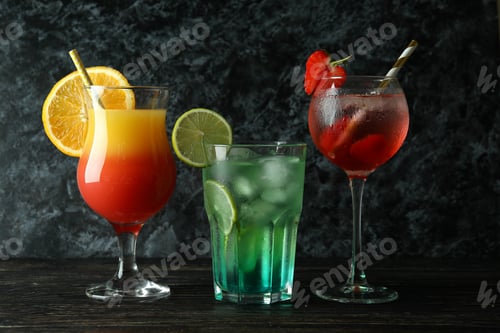 Preview: Fresh summer cocktails on wooden rustic table