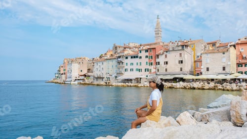 Preview: Enjoying the serene waterfront in Rovinj, Croatia while soaking up the sun on a summer day