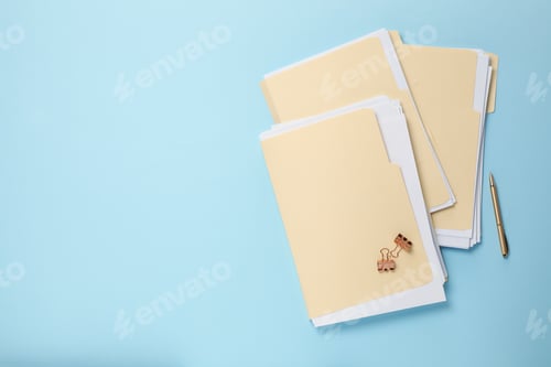 Preview: File folders with papers, pen and binder clips on light blue background, flat lay. Space for text