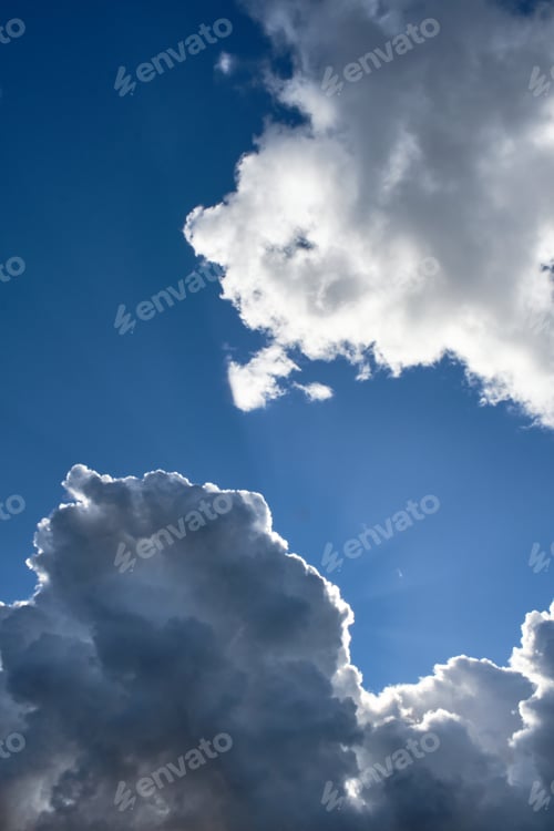 Preview: backlit stratocumulus clouds with blue sky in the background