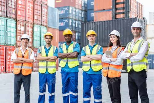 Preview: Portrait group of attractive worker people work in container terminal.