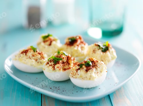 Preview: deviled eggs with paprika and green onion garnish