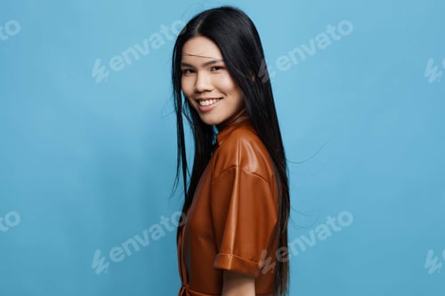 Preview: Smile woman asian happy trendy lifestyle portrait background beauty studio blue cute girl attractive