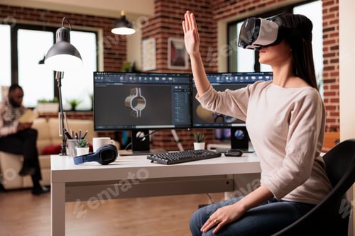 Preview: Asian engineer with vr headset developing product