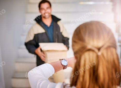 Preview: Shot of a businesswoman checking the time on her watch as the courier arrives with a delivery
