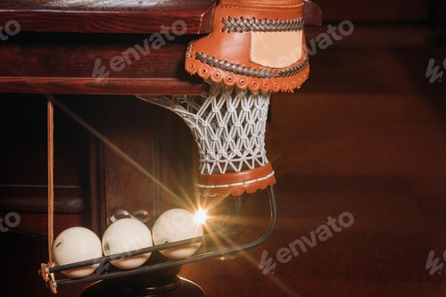 Preview: A pool table with balls that have already been played in the pool club.Playing billiards