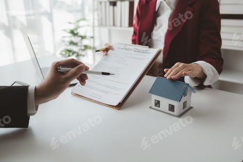 Preview: The broker is calculating the buyer's monthly instalment payments, Real estate broker agent presenti